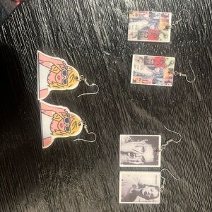 Taylor swift dangling earrings.